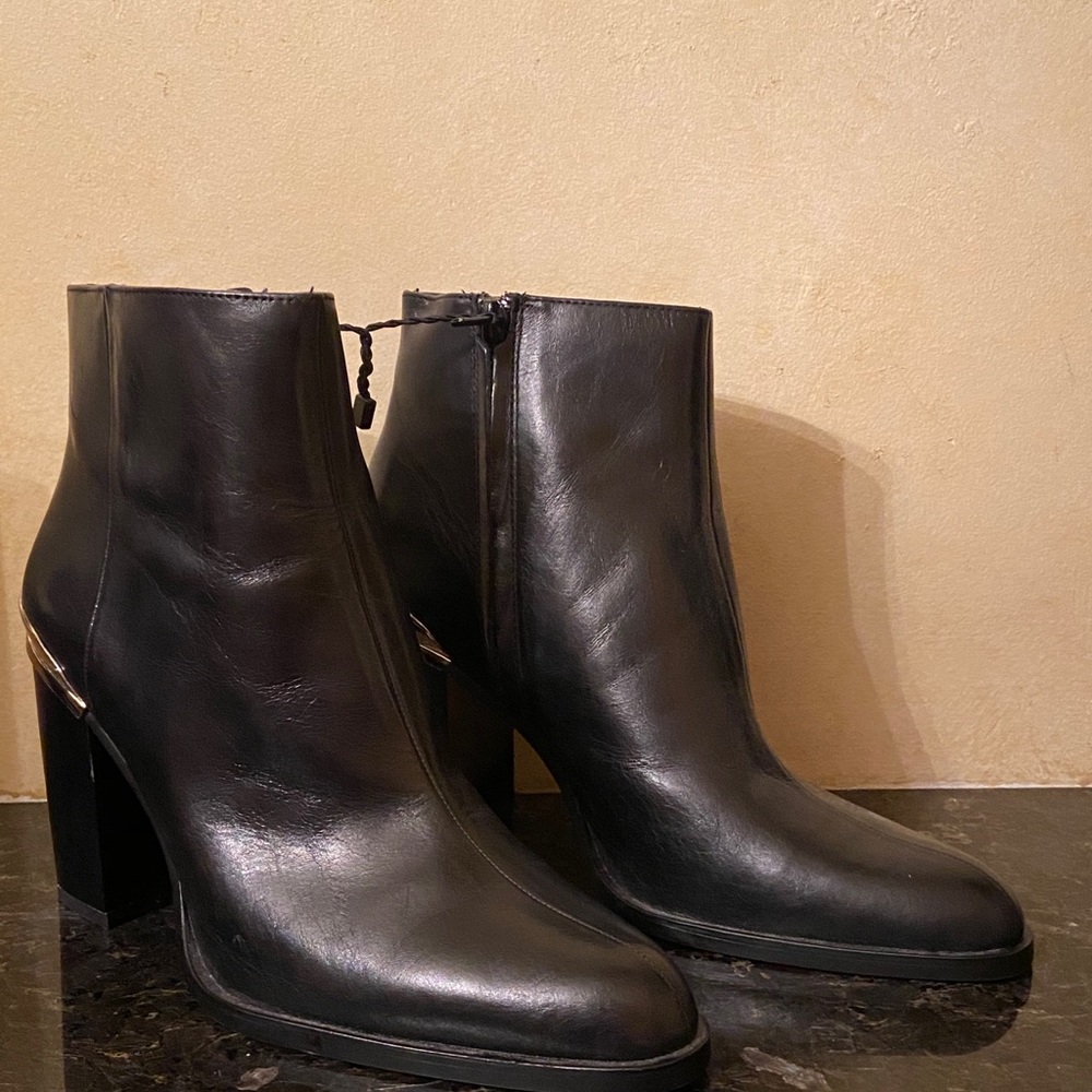 Zara black leather booties.